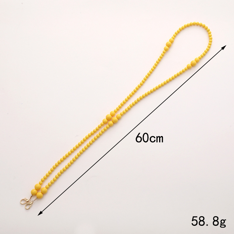 Simple Style Solid Color Bow Knot Arylic Nylon Beaded Mobile Phone Chain display picture 1
