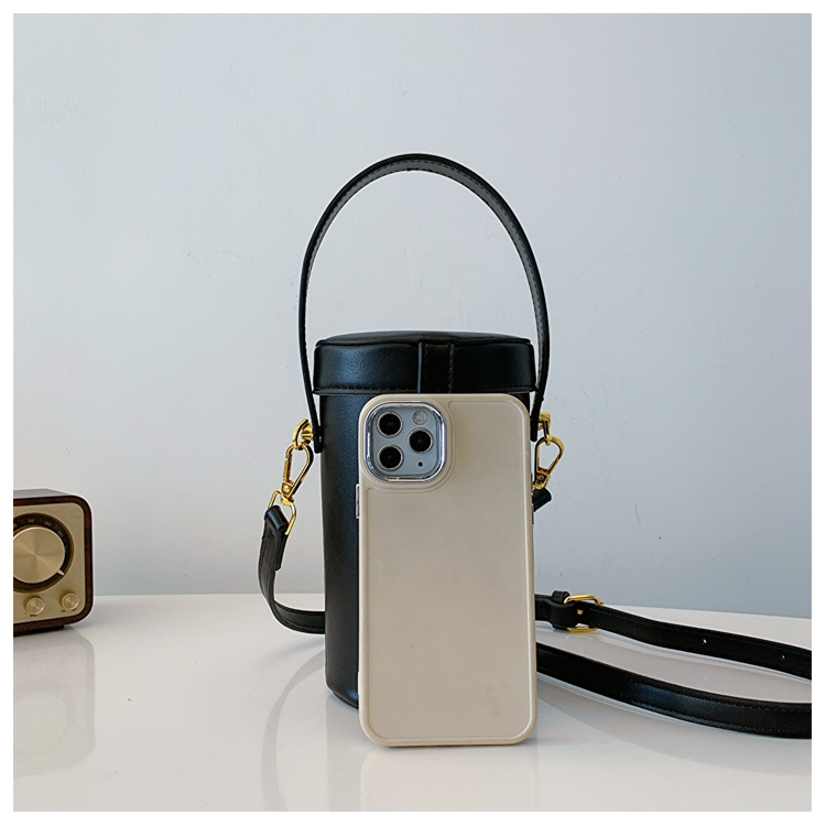 Women's Medium Pu Leather Solid Color Vintage Style Classic Style Sewing Thread Cylindrical Lock Clasp Crossbody Bag display picture 1