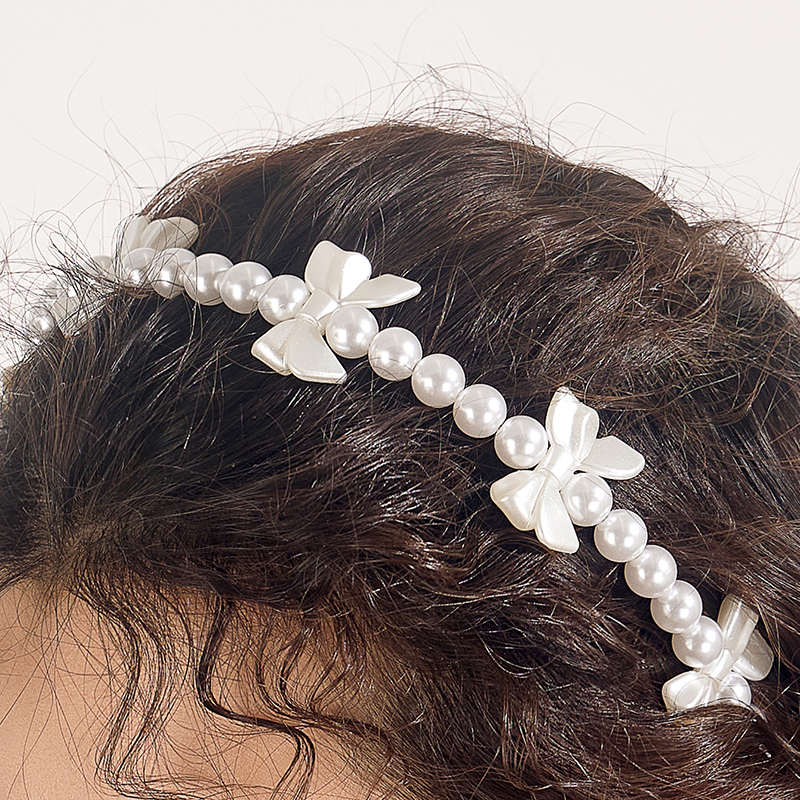 Women's Sweet Bow Knot Imitation Pearl Beaded Hair Band display picture 1