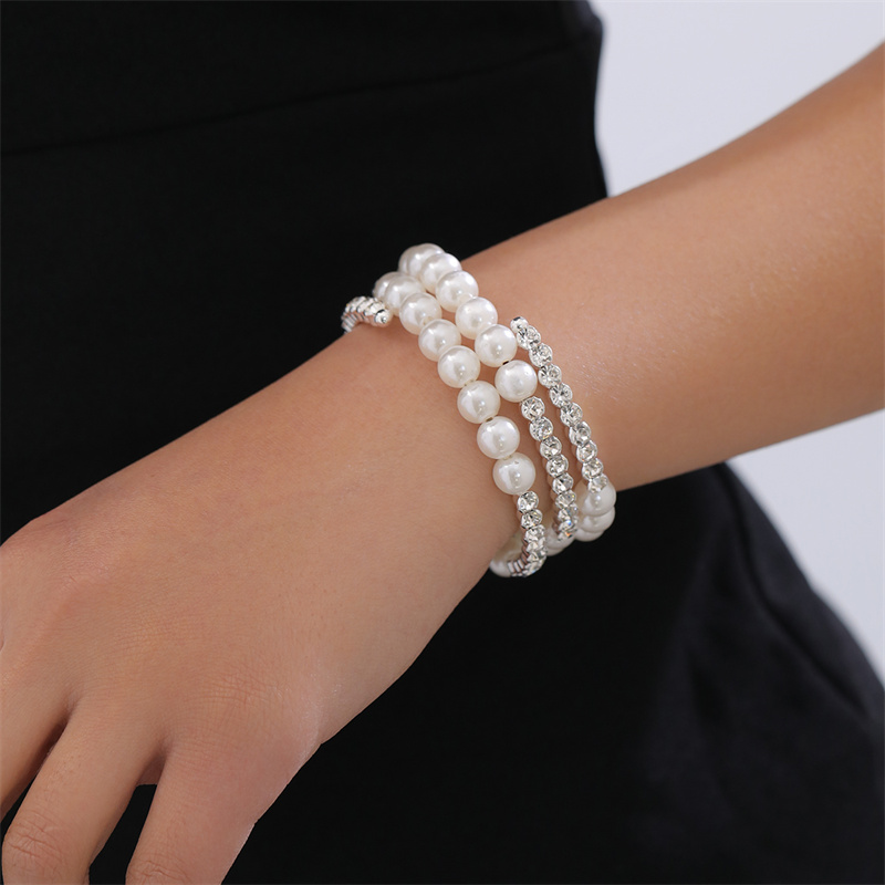 Simple Style Geometric Artificial Gemstones Artificial Pearl Zinc Alloy Layered Inlay Rhinestones Pearl Women's Wristband display picture 17