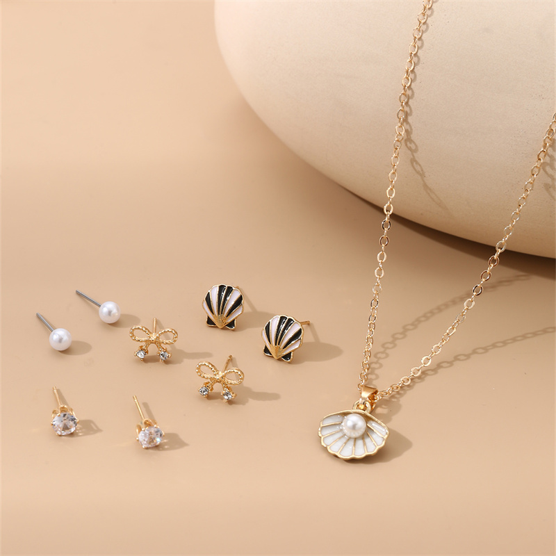 IG Style Modern Style Simple Style Fruit Heart Shape Bow Knot Alloy Inlay Artificial Pearls Rhinestones Women's Earrings Necklace display picture 1