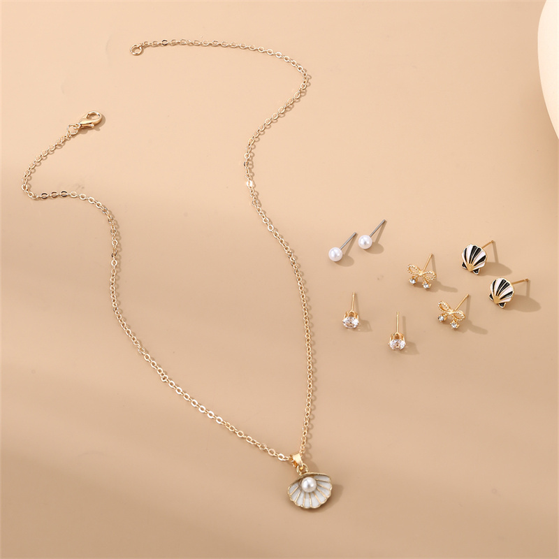 IG Style Modern Style Simple Style Fruit Heart Shape Bow Knot Alloy Inlay Artificial Pearls Rhinestones Women's Earrings Necklace display picture 4