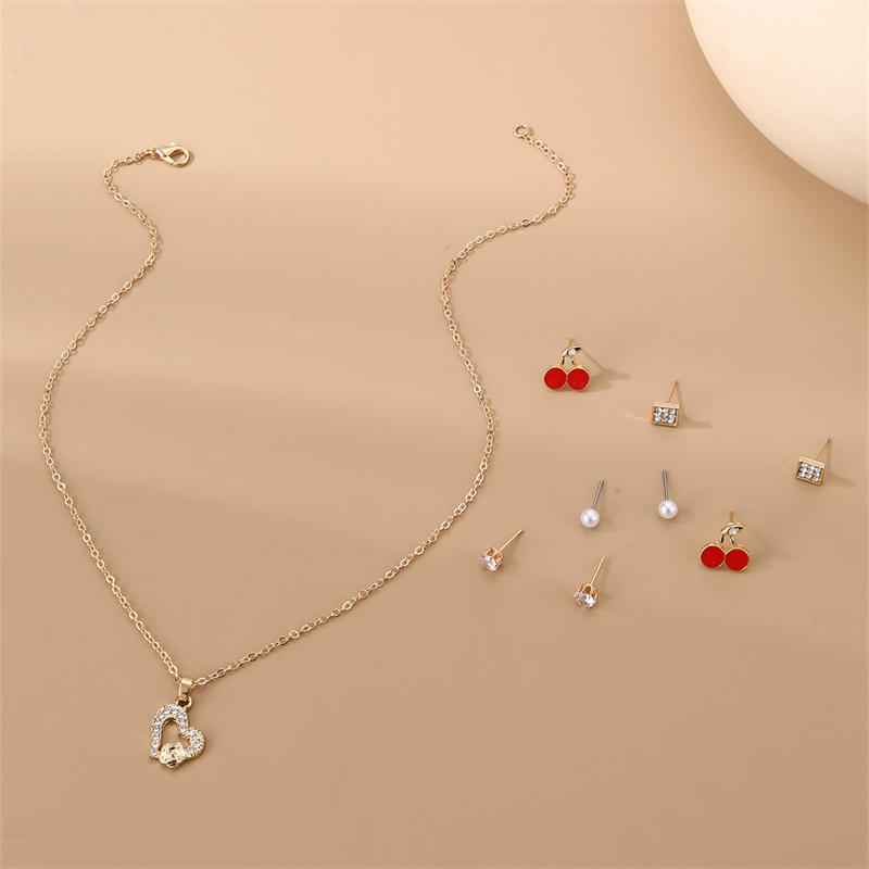 IG Style Modern Style Simple Style Fruit Heart Shape Bow Knot Alloy Inlay Artificial Pearls Rhinestones Women's Earrings Necklace display picture 9