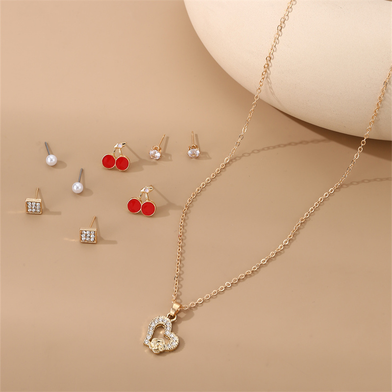 IG Style Modern Style Simple Style Fruit Heart Shape Bow Knot Alloy Inlay Artificial Pearls Rhinestones Women's Earrings Necklace display picture 10