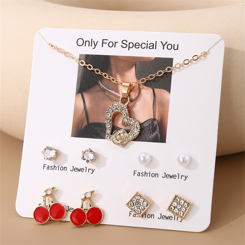 IG Style Modern Style Simple Style Fruit Heart Shape Bow Knot Alloy Inlay Artificial Pearls Rhinestones Women's Earrings Necklace display picture 12