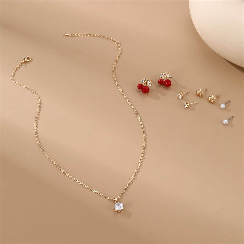 IG Style Modern Style Simple Style Fruit Heart Shape Bow Knot Alloy Inlay Artificial Pearls Rhinestones Women's Earrings Necklace display picture 37