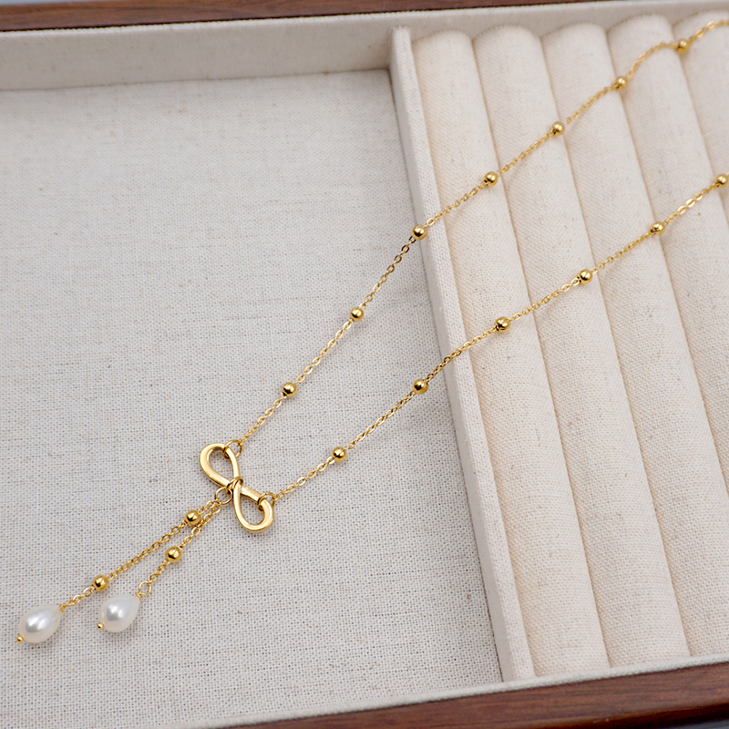 304 Stainless Steel Freshwater Pearl Gold Plated Casual Vintage Style Simple Style Infinity Bow Knot Pendant Necklace display picture 6
