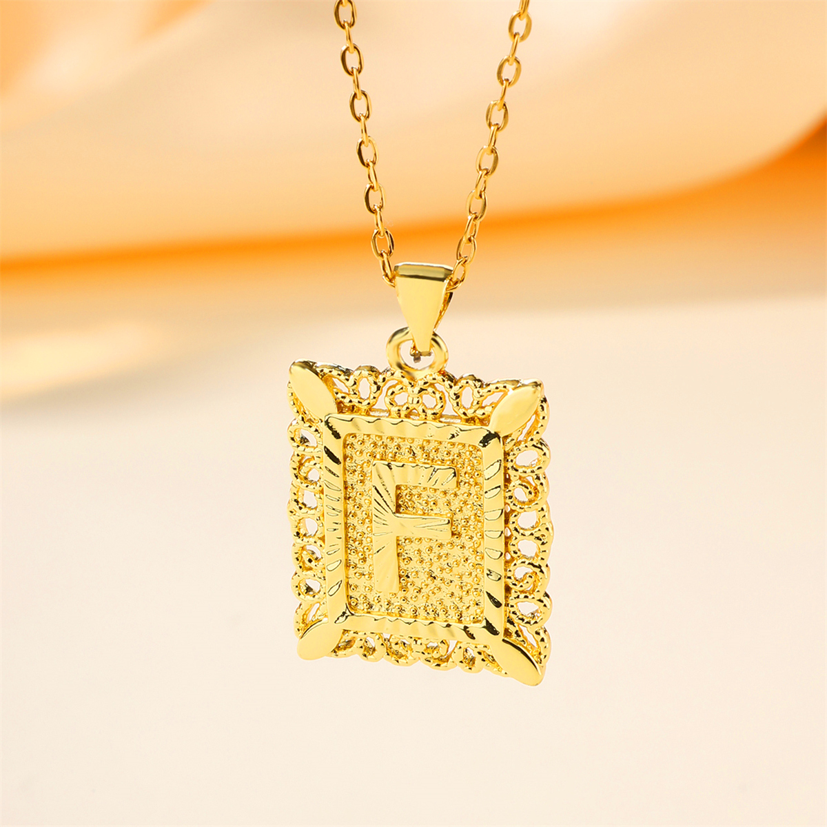 Copper 18K Gold Plated Casual Hollow Out Letter Pendant Necklace display picture 21