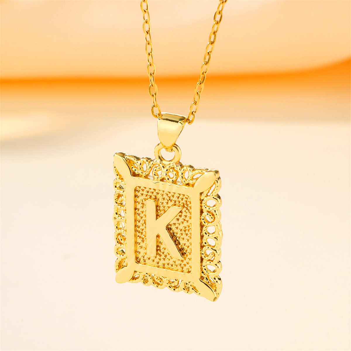 Copper 18K Gold Plated Casual Hollow Out Letter Pendant Necklace display picture 14