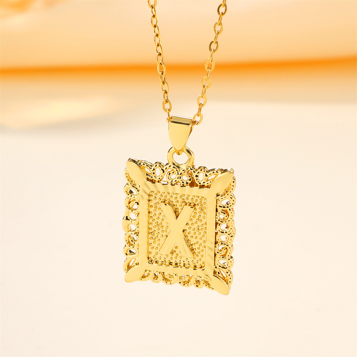 Copper 18K Gold Plated Casual Hollow Out Letter Pendant Necklace display picture 7