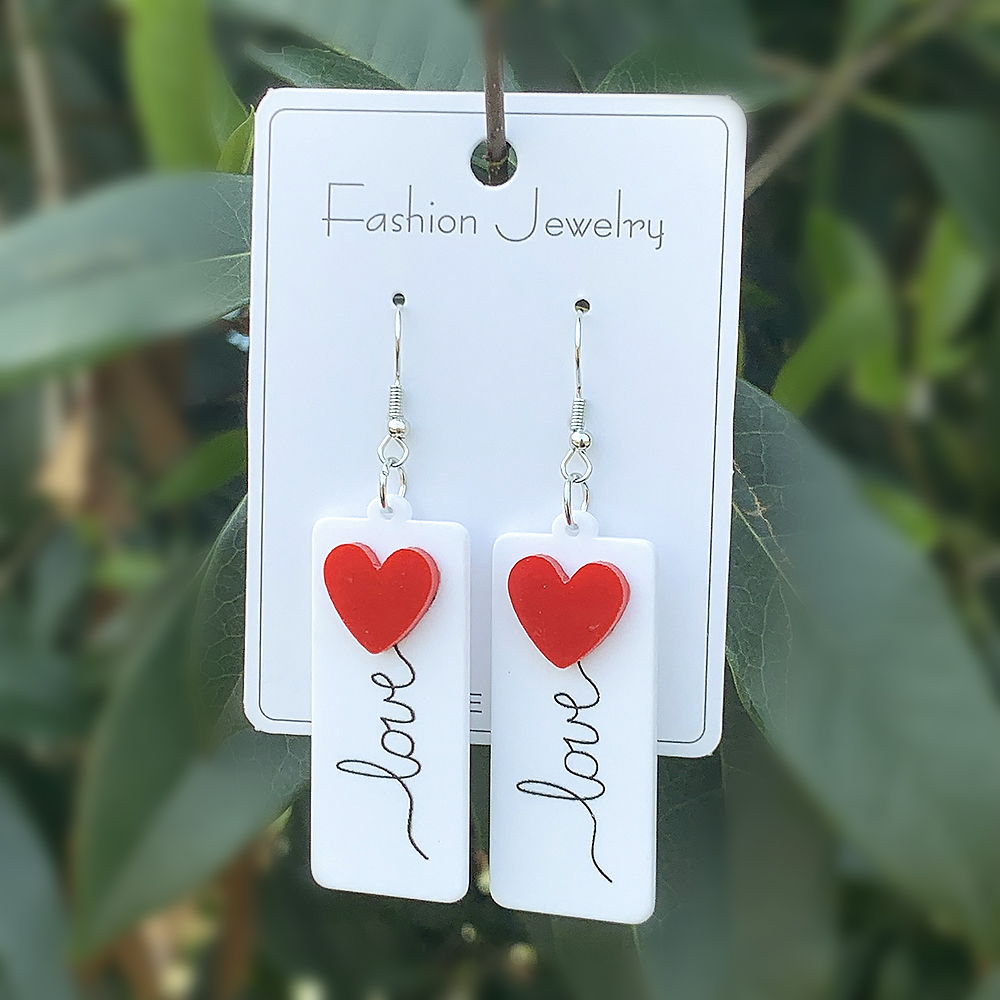 1 Pair Casual Hawaiian Heart Shape Arylic Drop Earrings display picture 3