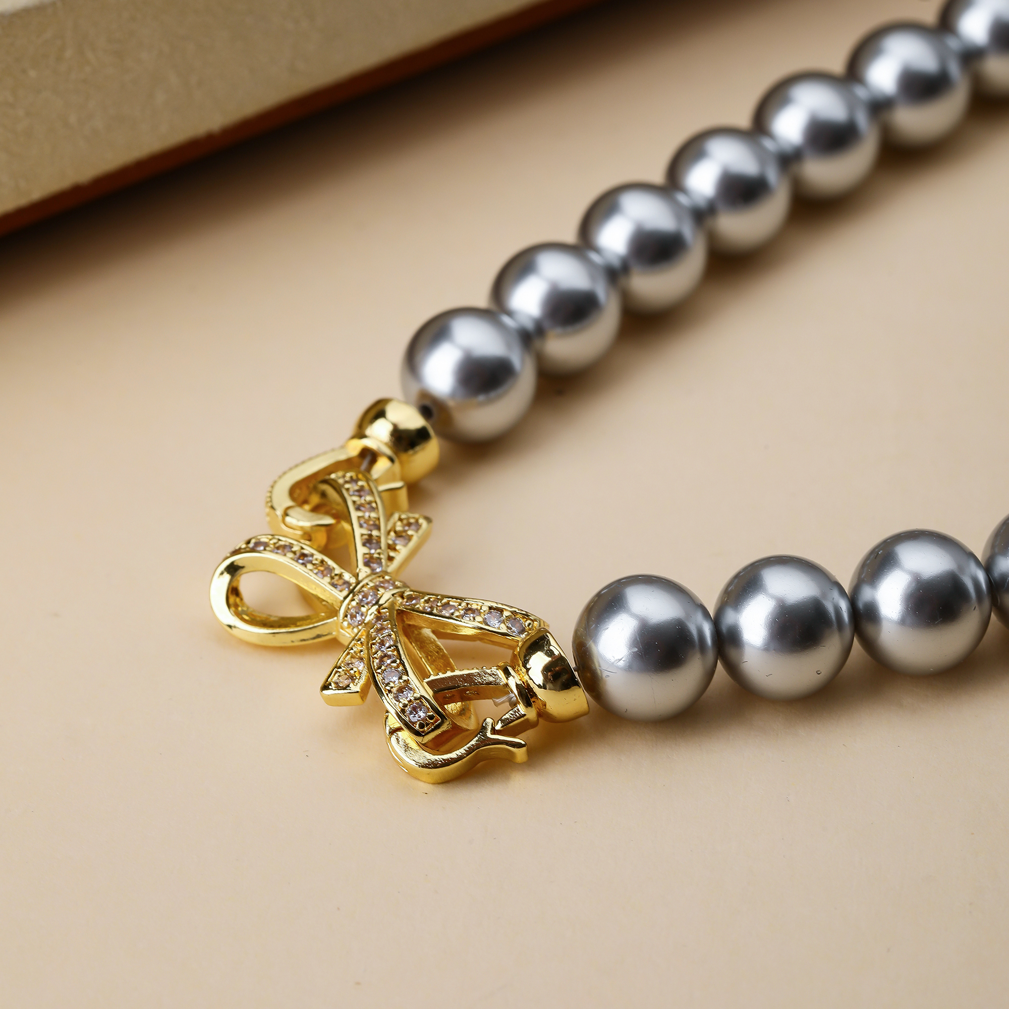 Großhandel Schmuck Elegant Glam Bogenknoten Künstliche Perle Kupfer Zirkon Inlay Halskette display picture 2