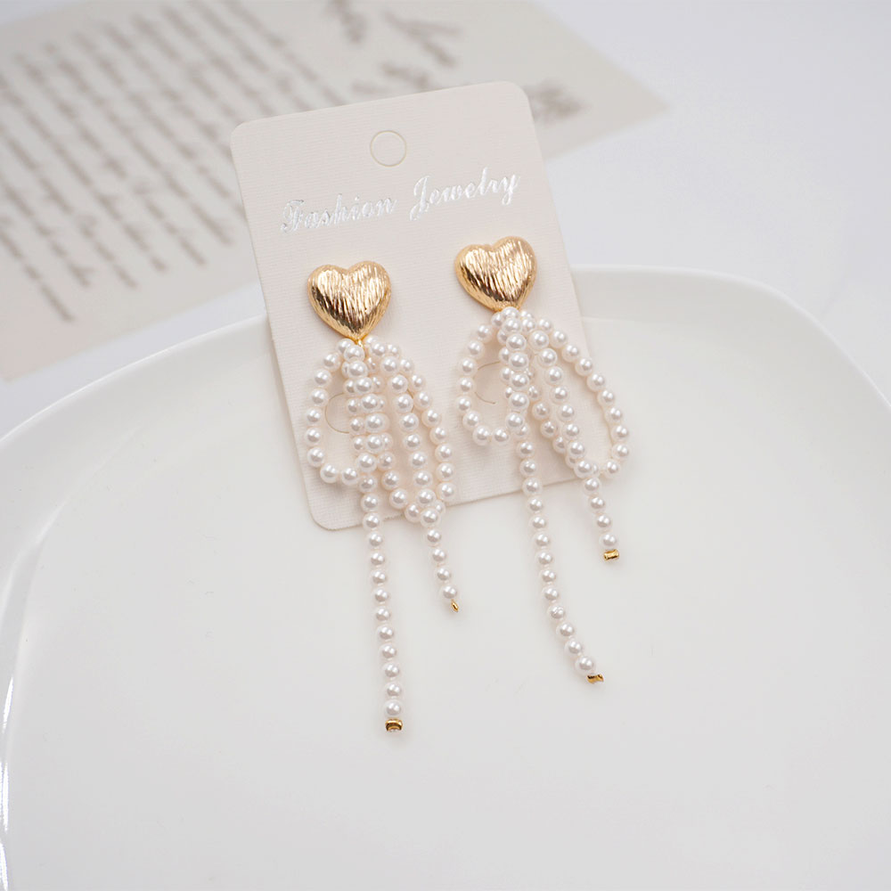 1 Paar Vintage-Stil Ethnischer Stil Herzform Bogenknoten Perlen Überzug Imitationsperle Kupfer Vergoldet Tropfenohrringe display picture 3