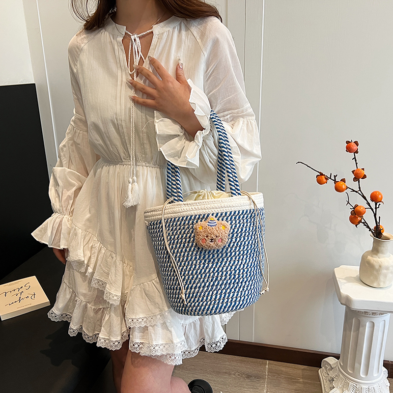 Women's Medium Fabric Cartoon Solid Color Cute Beach Weave String Shoulder Bag display picture 9