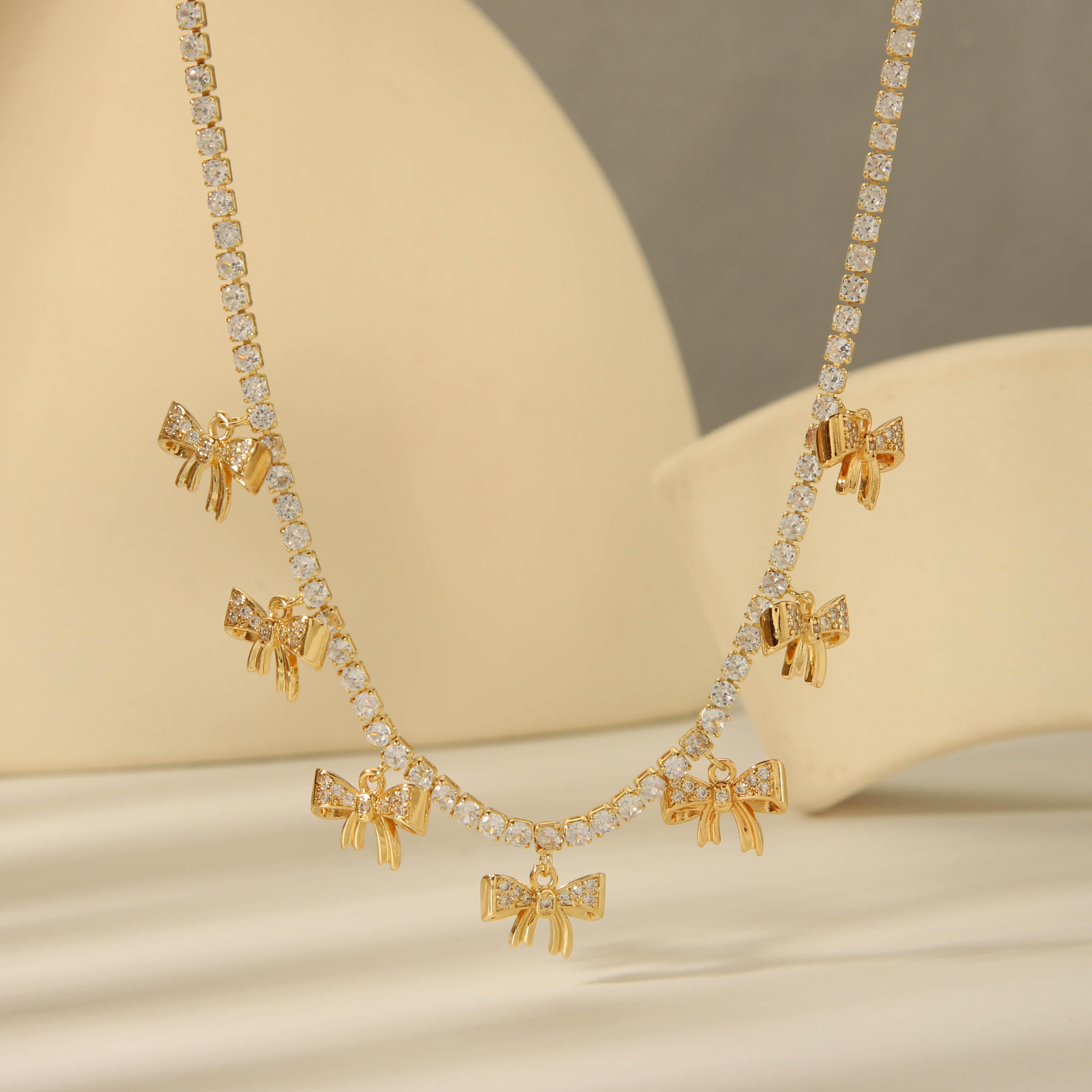 Kupfer 18 Karat Vergoldet IG-Stil Romantisch Pendeln Überzug Inlay Bogenknoten Zirkon Ohrringe Halskette display picture 3