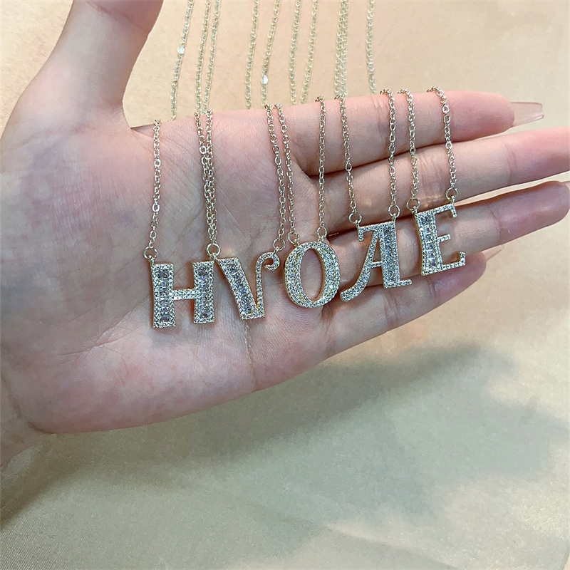 Wholesale Elegant Shiny Letter 304 Stainless Steel Copper Three-dimensional Inlay K Gold Plated Zircon Pendant Necklace display picture 3