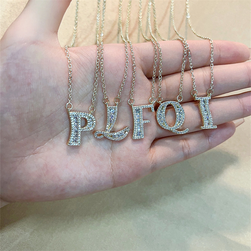 Wholesale Elegant Shiny Letter 304 Stainless Steel Copper Three-dimensional Inlay K Gold Plated Zircon Pendant Necklace display picture 4