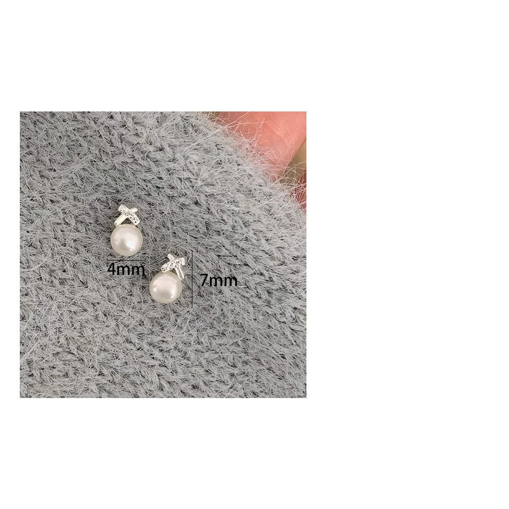 1 Pair Simple Style Bow Knot Inlay Sterling Silver Pearl Zircon Ear Studs display picture 1