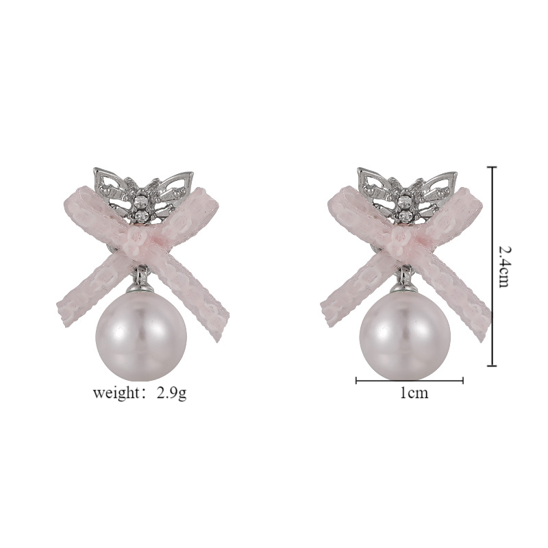 1 Pair Sweet Simple Style Bow Knot Inlay Alloy Pearl Drop Earrings display picture 1