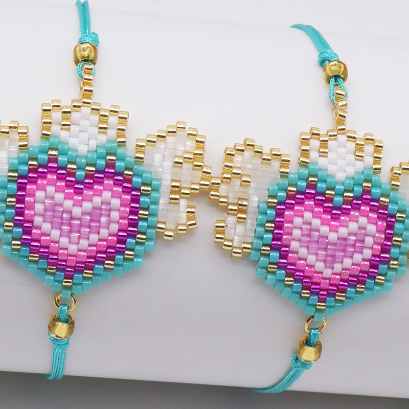 Joyería Al Por Mayor Estilo IG Casual Estilo De Dibujos Animados Forma De Corazón Alas Vidrio Soga Con Cuentas Tejido De Punto Pulsera display picture 2