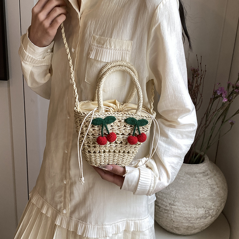 Women's Medium Straw Solid Color Flower Vacation Beach Weave Bucket String Straw Bag display picture 2