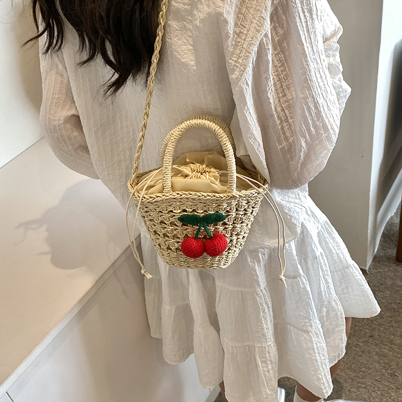 Women's Medium Straw Solid Color Flower Vacation Beach Weave Bucket String Straw Bag display picture 6