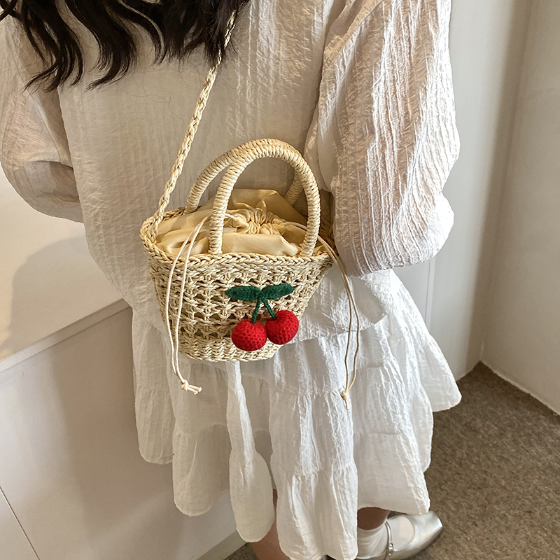 Women's Medium Straw Solid Color Flower Vacation Beach Weave Bucket String Straw Bag display picture 5