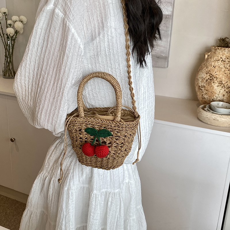 Women's Medium Straw Solid Color Flower Vacation Beach Weave Bucket String Straw Bag display picture 8