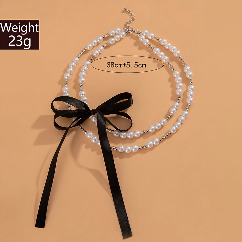 Großhandel Schmuck Elegant Luxuriös Bogenknoten Legierung Künstliche Perlen Geschichtet Kette Inlay Halsband display picture 1