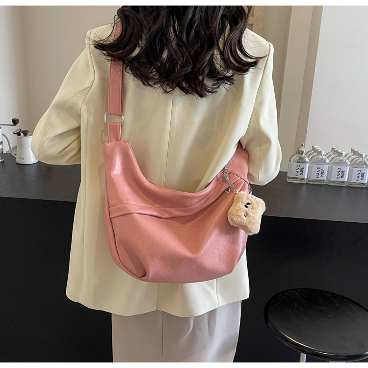 Women's Medium Pu Leather Solid Color Classic Style Sewing Thread Dumpling Shape Zipper Crossbody Bag display picture 11