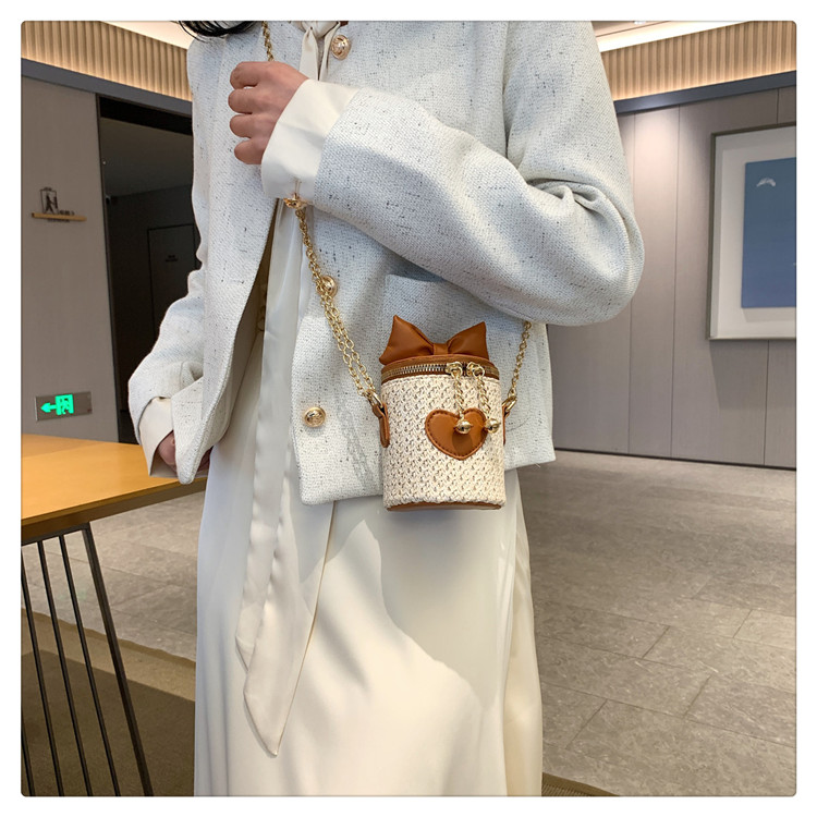 Women's Small Straw Heart Shape Solid Color Cute Basic Bowknot Cylindrical Zipper Crossbody Bag display picture 16