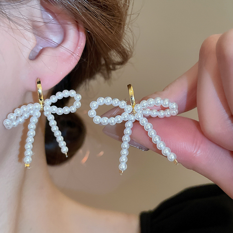 1 Paar Elegant Einfacher Stil Bogenknoten Perlen Imitationsperle Legierung Tropfenohrringe display picture 1