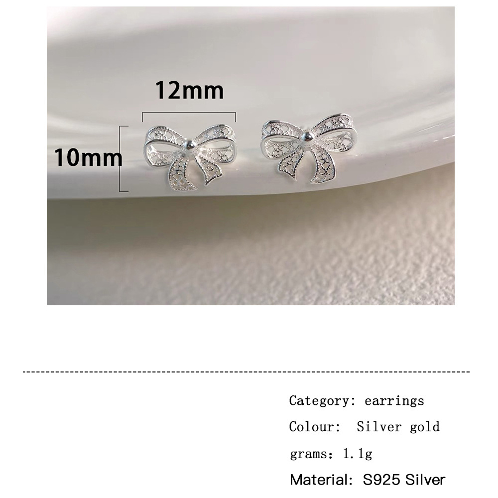 1 Pair Simple Style Bow Knot Hollow Out Sterling Silver Ear Studs display picture 3