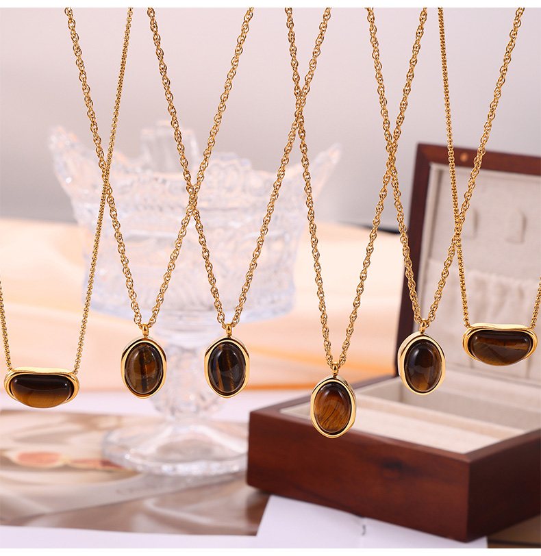 304 Stainless Steel 18K Gold Plated Retro British Style Plating Inlay Oval Pea Natural Stone Tiger Eye Pendant Necklace display picture 1