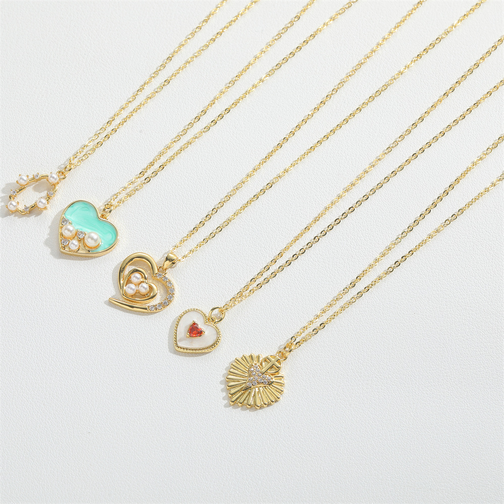 Wholesale Vintage Style Simple Style Heart Shape Copper Enamel Inlay 14K Gold Plated Artificial Pearls Zircon Pendant Necklace display picture 1