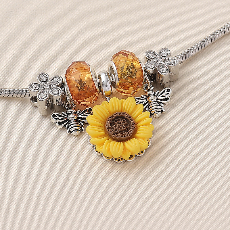 Wholesale Jewelry Pastoral Sunflower Synthetic Resin Alloy Rhinestones Inlay Bangle display picture 1