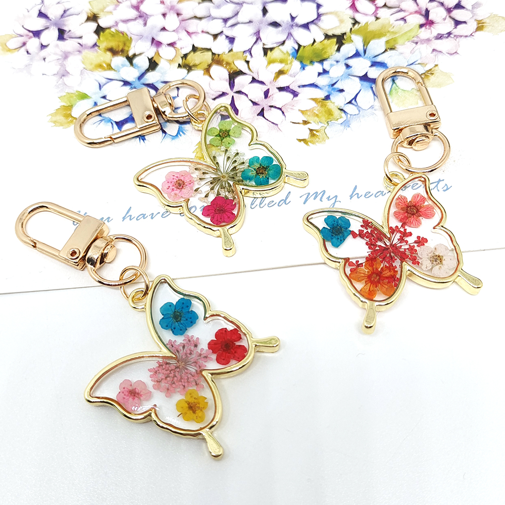 Simple Style Classic Style Animal Dried Flower Alloy Resin Keychain display picture 9