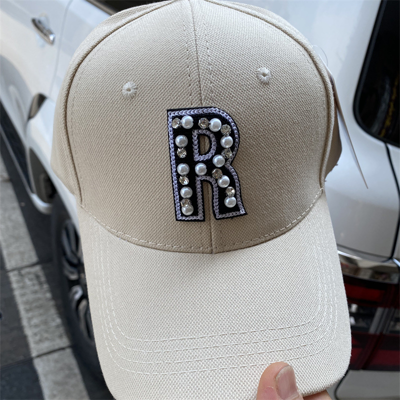 Adults Casual Hip-Hop Commute Letter Pearl Curved Eaves Baseball Cap display picture 4