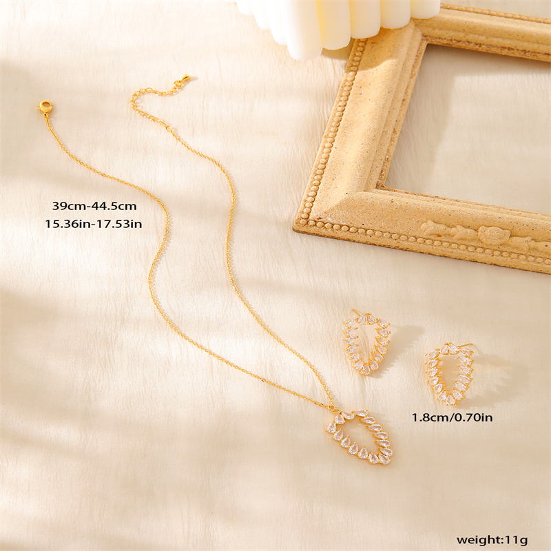 Kupfer 18 Karat Vergoldet Elegant Dame Braut Inlay Kiefernzapfen Zirkon Ohrringe Halskette display picture 1