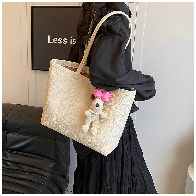 Women's Large Pu Leather Solid Color Basic Classic Style Sewing Thread Magnetic Buckle Tote Bag display picture 11