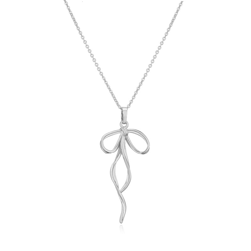 Copper Casual Elegant Simple Style Inlay Bow Knot Artificial Pearls Zircon Pendant Necklace display picture 11