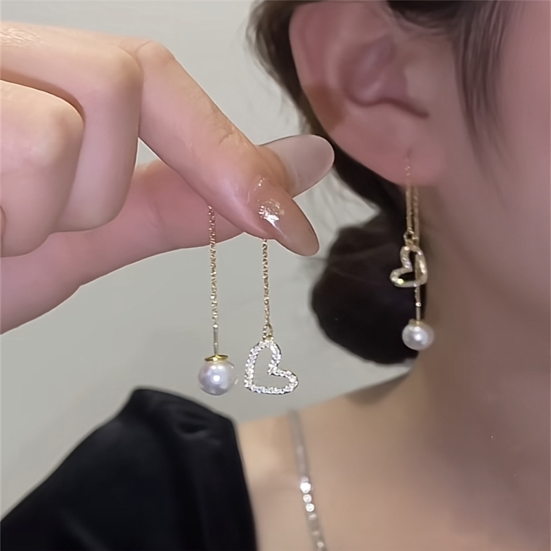 1 Pair Modern Style Classic Style Korean Style Tassel Heart Shape Inlay Zinc Alloy Artificial Pearls Rhinestones Ear Line display picture 1