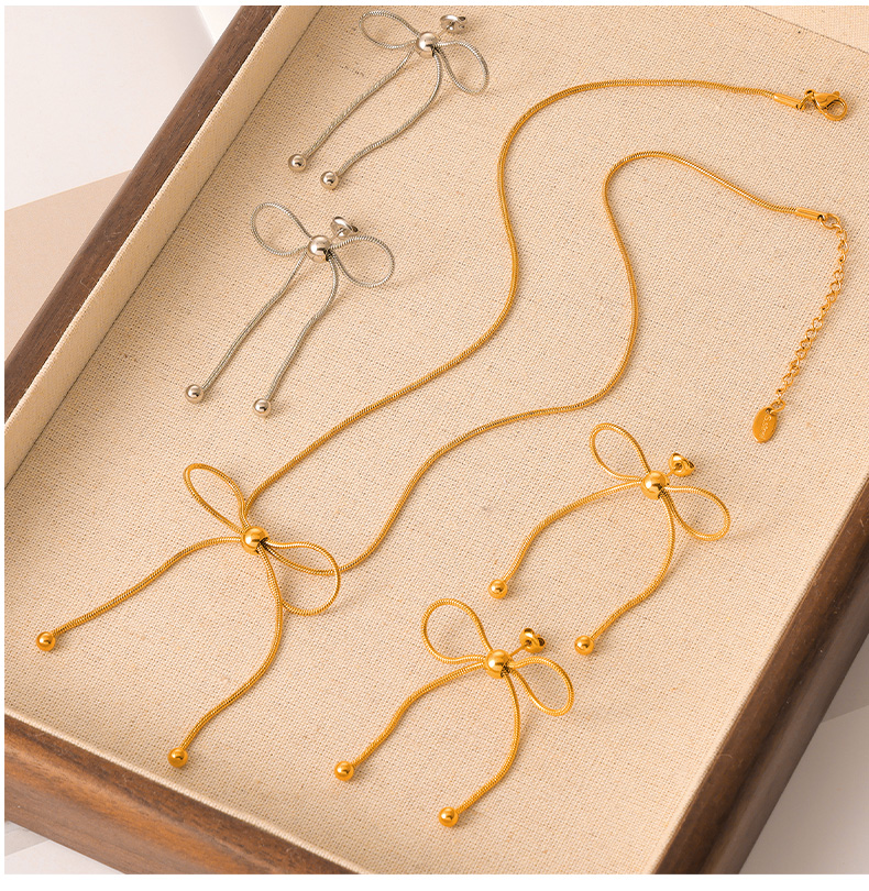 Titan Stahl 18 Karat Vergoldet IG-Stil Einfacher Stil Bogenknoten Ohrringe Halskette display picture 5