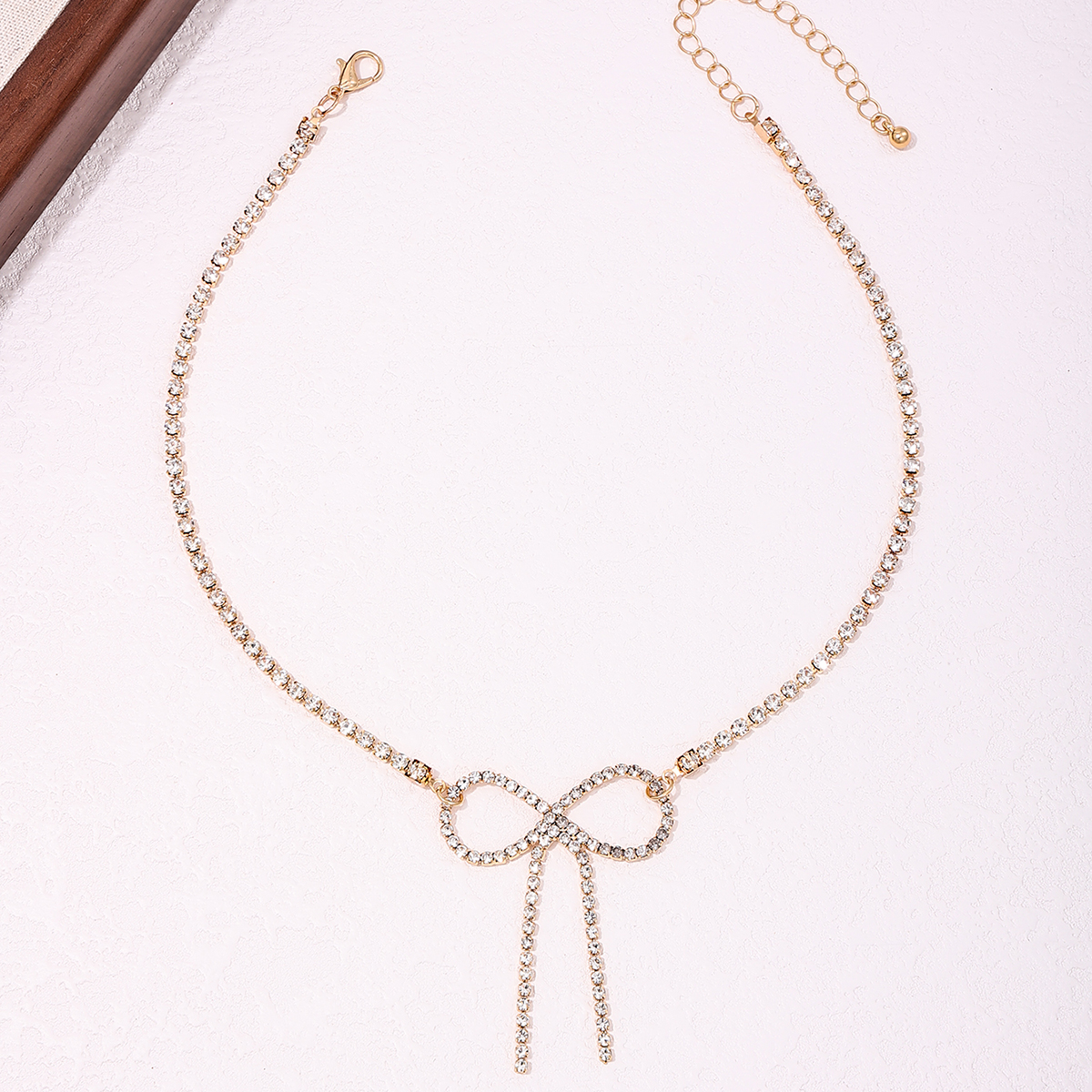 Wholesale Jewelry Sweet Shiny Bow Knot Copper Alloy Glass Inlay Pendant Necklace display picture 2