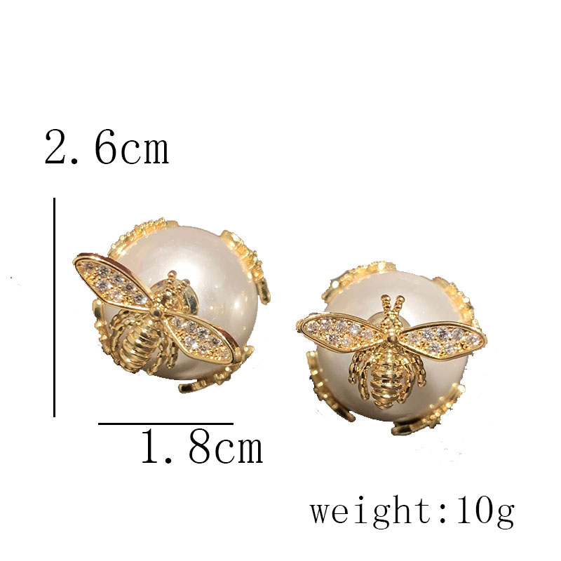 1 Pair Simple Style Shiny Bee Hollow Out Inlay Sequin Brass Artificial Pearls Zircon Gold Plated Ear Studs display picture 1