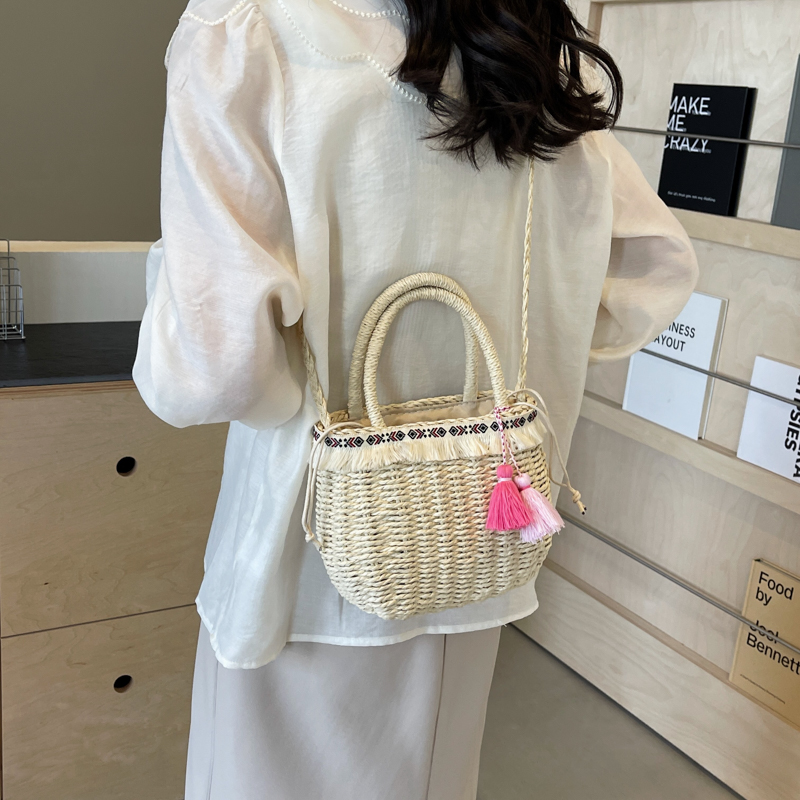 Women's Medium Straw Solid Color Vacation Beach Weave Hollow String Straw Bag display picture 5
