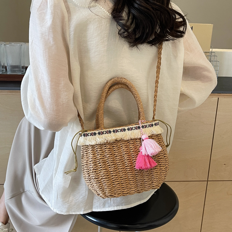 Women's Medium Straw Solid Color Vacation Beach Weave Hollow String Straw Bag display picture 9