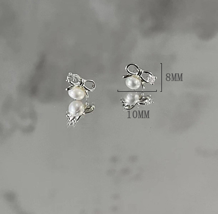 1 Pair Simple Style Bow Knot Inlay Sterling Silver Pearl Ear Studs display picture 10