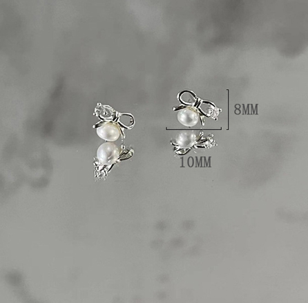 1 Paire Style Simple Noeud D'Arc Incruster Argent Sterling Perle Boucles D'Oreilles display picture 10