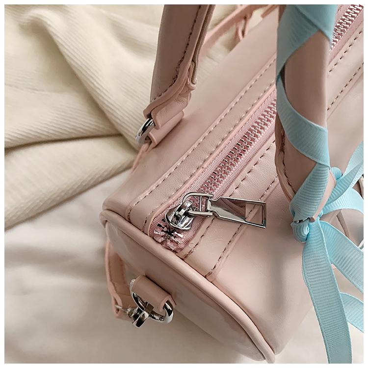 Women's Medium Pu Leather Solid Color Bow Knot Streetwear Cylindrical Zipper Crossbody Bag display picture 1